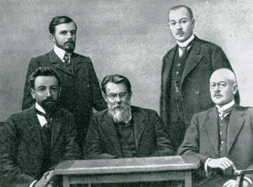 Academician V I Vernadsky among his young students at Moscow University. Vernadsky is sitting in the centre and Fersman is standing on the right. Photograph taken in 1911/2.